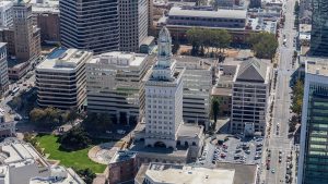 Oakland City Council cuts police budget by $18 million to reallocate to violence prevention programs; draws criticism from police chief