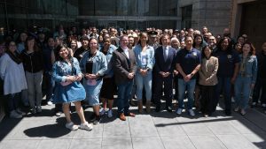 Donning denim in solidarity with victims and...